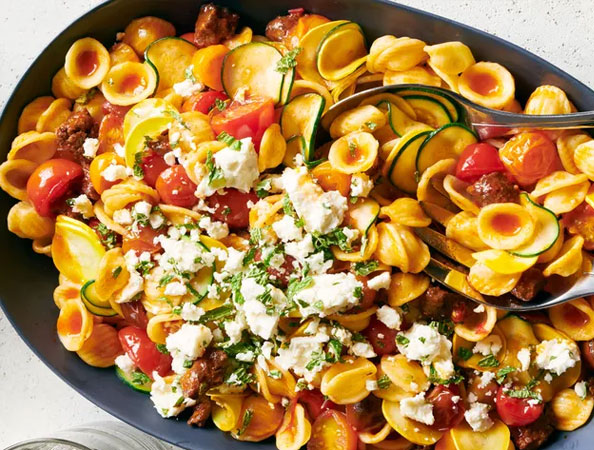 Spicy Sausage Pasta with Tomatoes and Squash